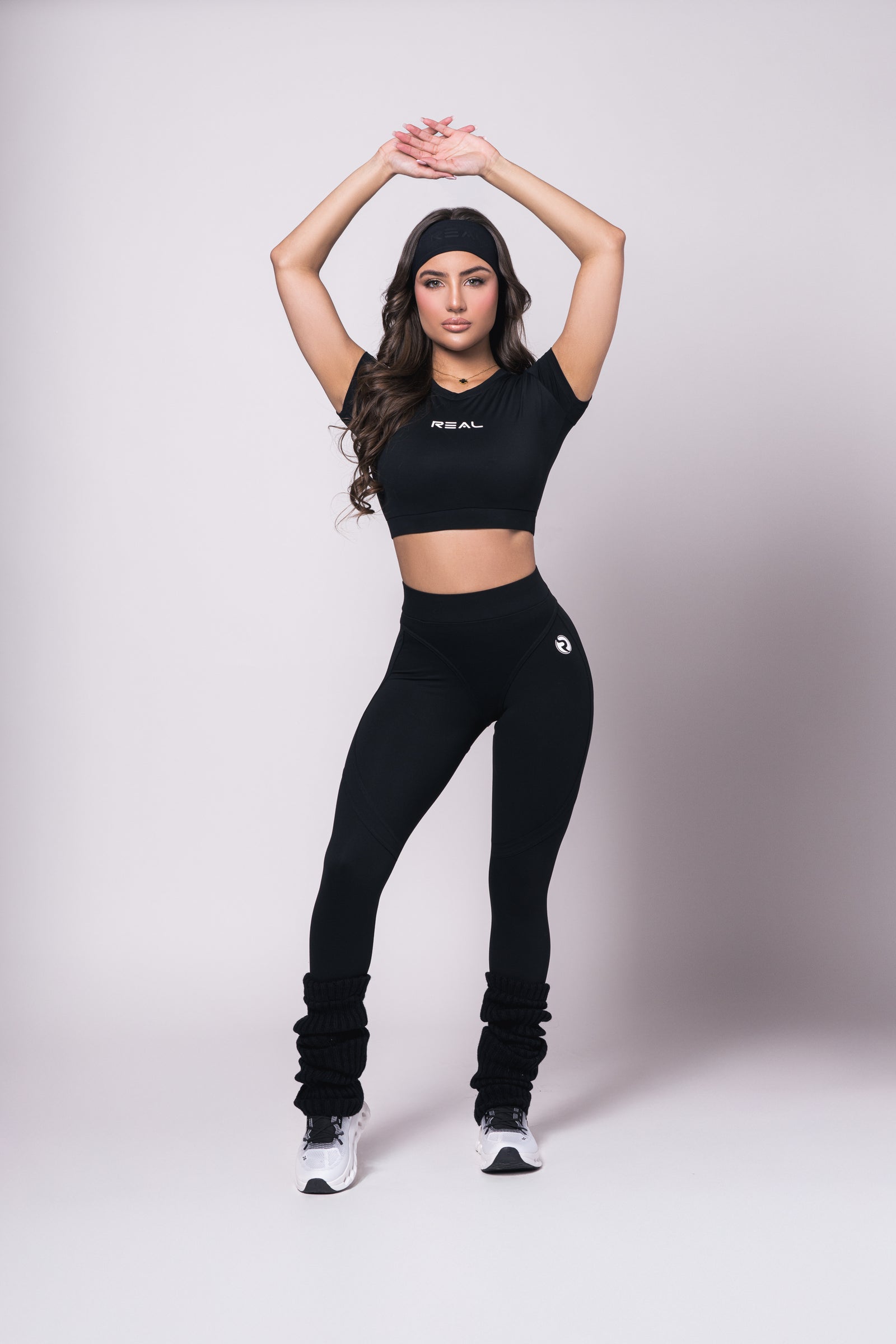 Black body-contouring activewear crop top for women - Real Wear US seamless compression